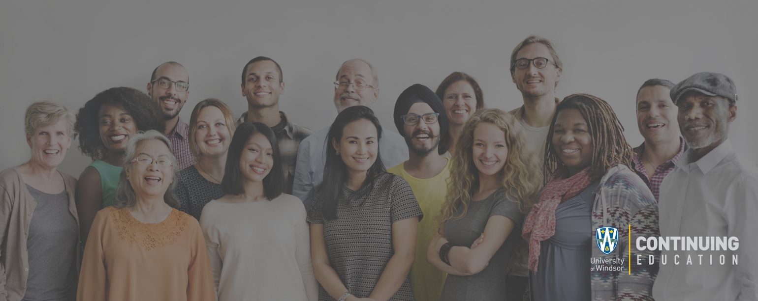 Group of diverse people smiling and looking at camera